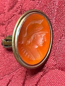 Carnelian intaglio seal matrix showing a the head of a Roman soldier