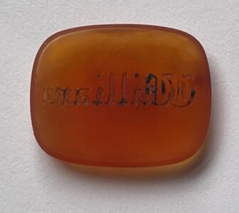 William. An unmounted carnelian seal or ring matrix engraved with the single name William
