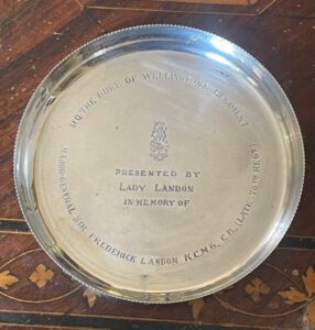 Duke of Wellington's Regiment. A silver plated bottle coaster