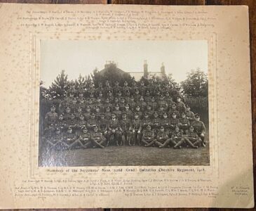 Cheshire Regiment. A group photograph of NCOs with the Colonel & Adjutant. 1918 all named.