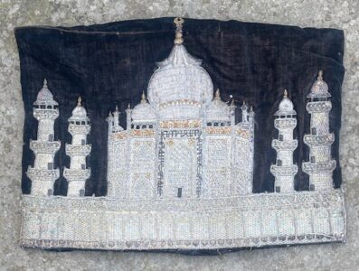 An unusual depiction of the Taj Mahal in silver lace on velvet An unusual depiction of the Taj Mahal in silver lace on velvet