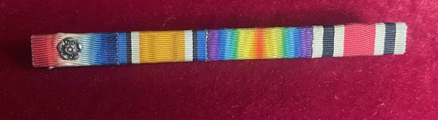 WWI medal ribbon bar with pin fastening. WWI medal ribbon bar with pin fastening.