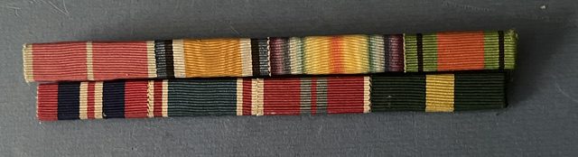 A set of ribbons showing a Territorial Officer's long and distinguished service A set of ribbons showing a Territorial Officer's long and distinguished service
