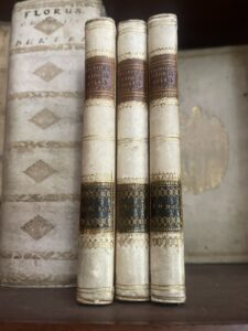 Three decorative full vellum Italian volumes on the History of Tuscany, 1815