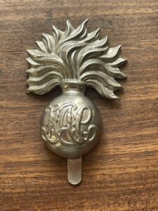 Honourable Artillery Company. A white metal grenade patterm cap badge Honourable Artillery Company. A white metal grenade patterm cap badge